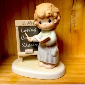 Precious Moments Teach us to love one another